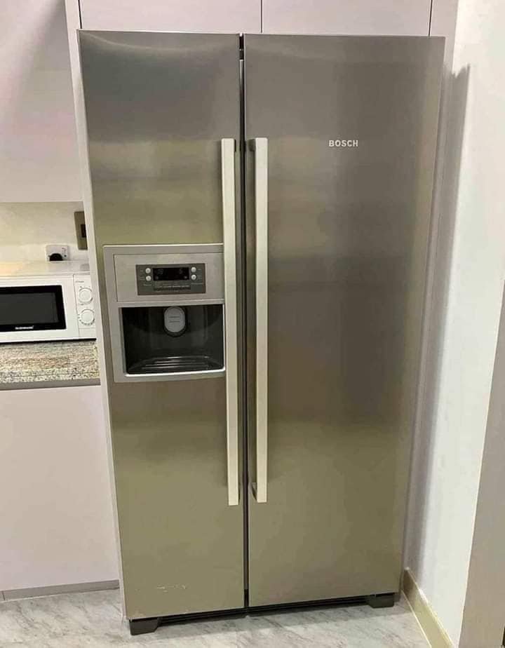 Bosch Fridge Freezer ice maker and water dispenser 700 Litters Capcity about wide is 90cm height is 180cm